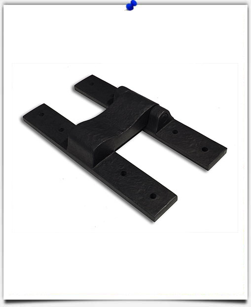 bronze hardware on wood door