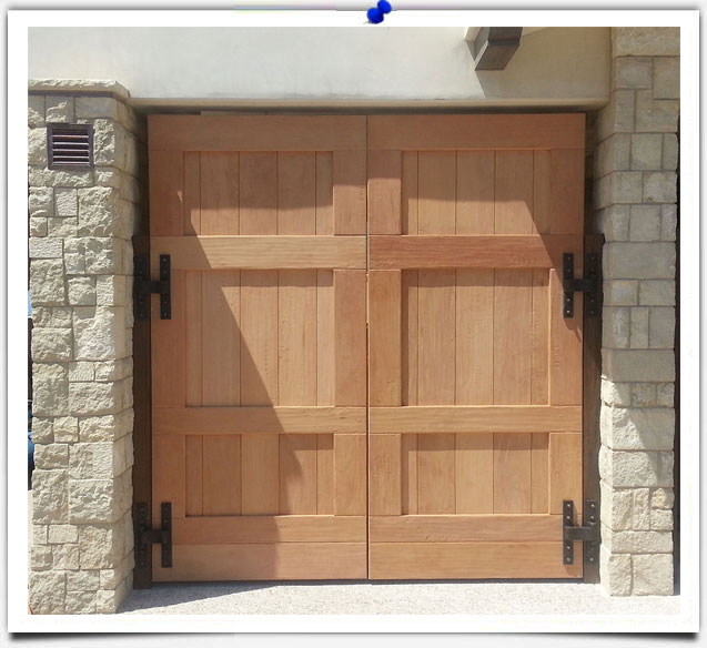 bronze hardware on wood door